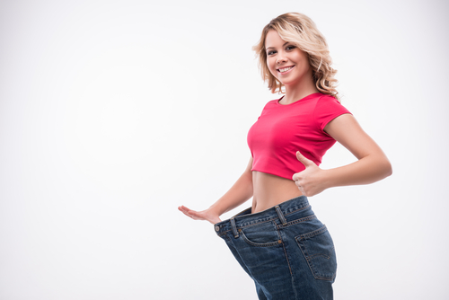 a patient happy with the results of  Liposculpture for Women